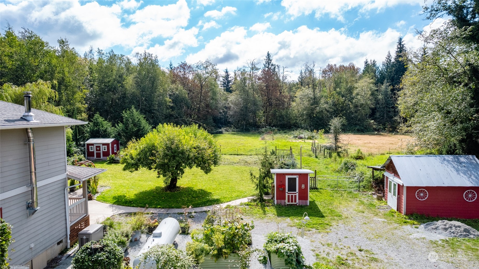 23610 Hoogdal Road Sedro-Woolley, WA 98284 - Photo 37 of 39 an aerial view of a house with yard swimming pool and outdoor seating