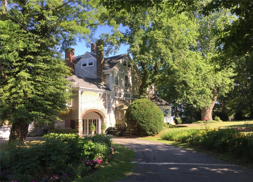 WELCOME to 44 Bliss Mine Road in Middletown, bordering Newport RI