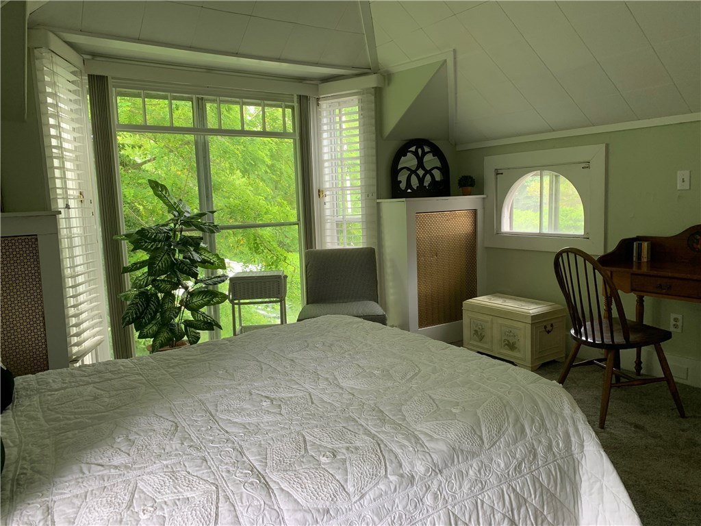 44 Bliss Mine Road, Unit 3 Middletown, RI 02842 - Photo 13 of 35 Bedroom unique window with view of a Coffee tree