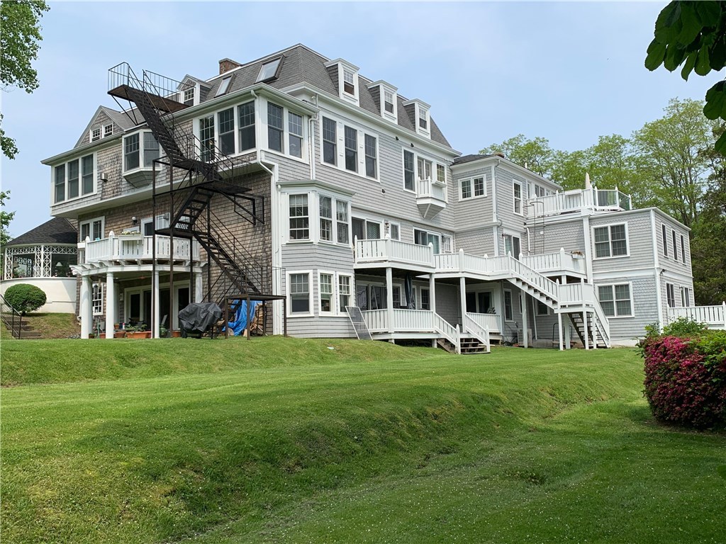 44 Bliss Mine Road, Unit 3 Middletown, RI 02842 - Photo 23 of 35 Rear View and terraced lawn