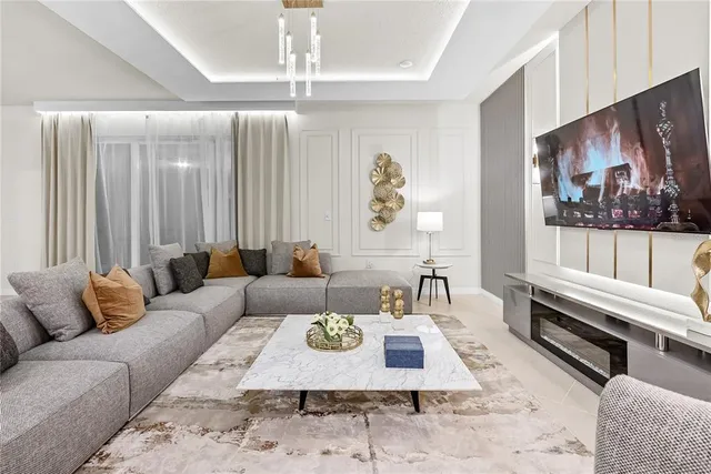 a bedroom with a bed and a large mirror