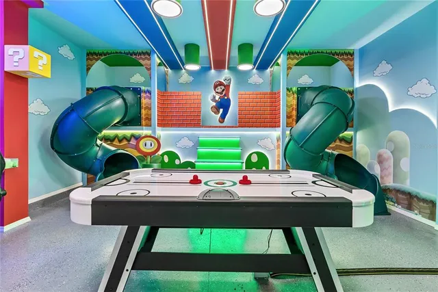 a bedroom with a bed mirror and a large window