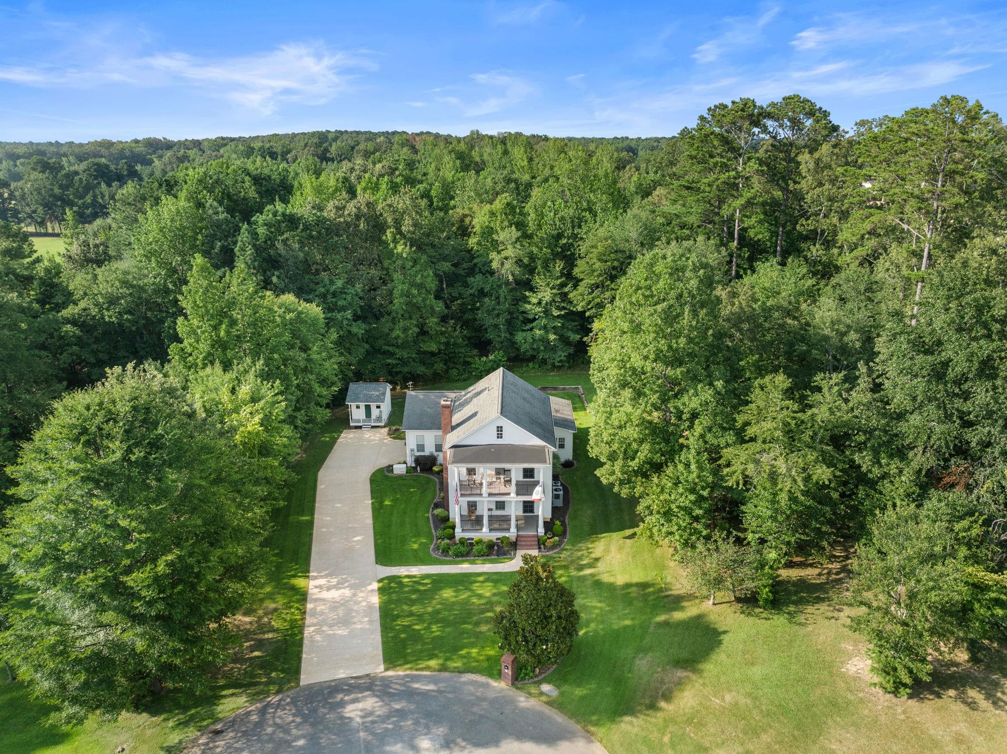 20 Tadpole Lane Corinth, MS 38834 - Photo 15 of 38 Aerial view of property and surrounding area with a forest