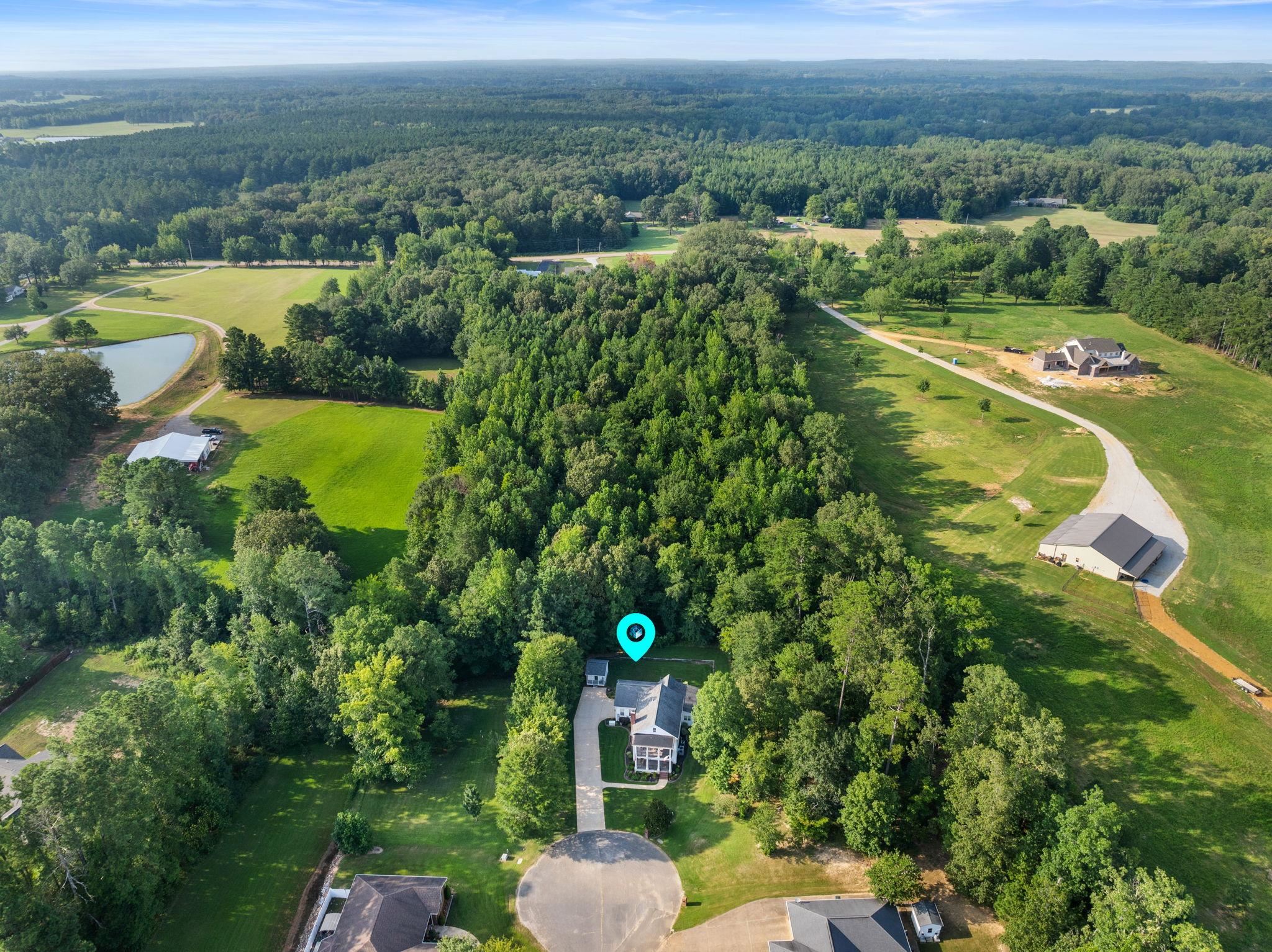 20 Tadpole Lane Corinth, MS 38834 - Photo 18 of 38 View of property location featuring a heavily wooded area and a nearby body of water