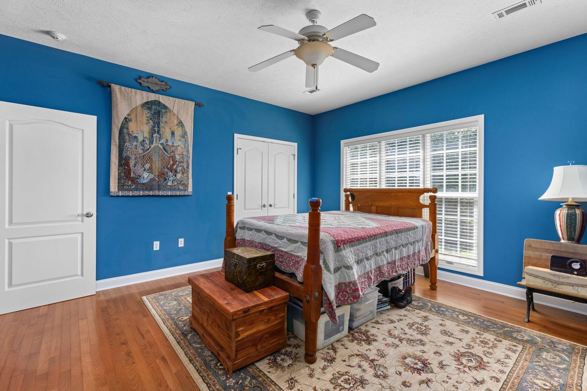 20 Tadpole Lane Corinth, MS 38834 - Photo 23 of 38 a bed room with a bed and a couch