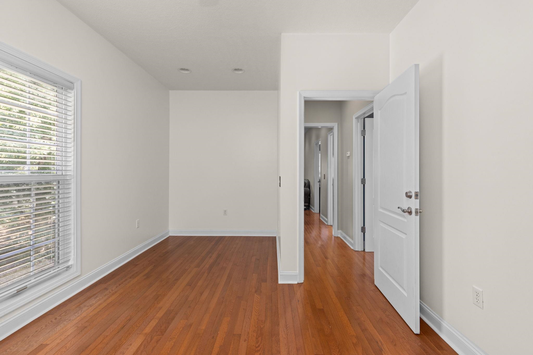 20 Tadpole Lane Corinth, MS 38834 - Photo 25 of 38 a view of a hallway with wooden floor
