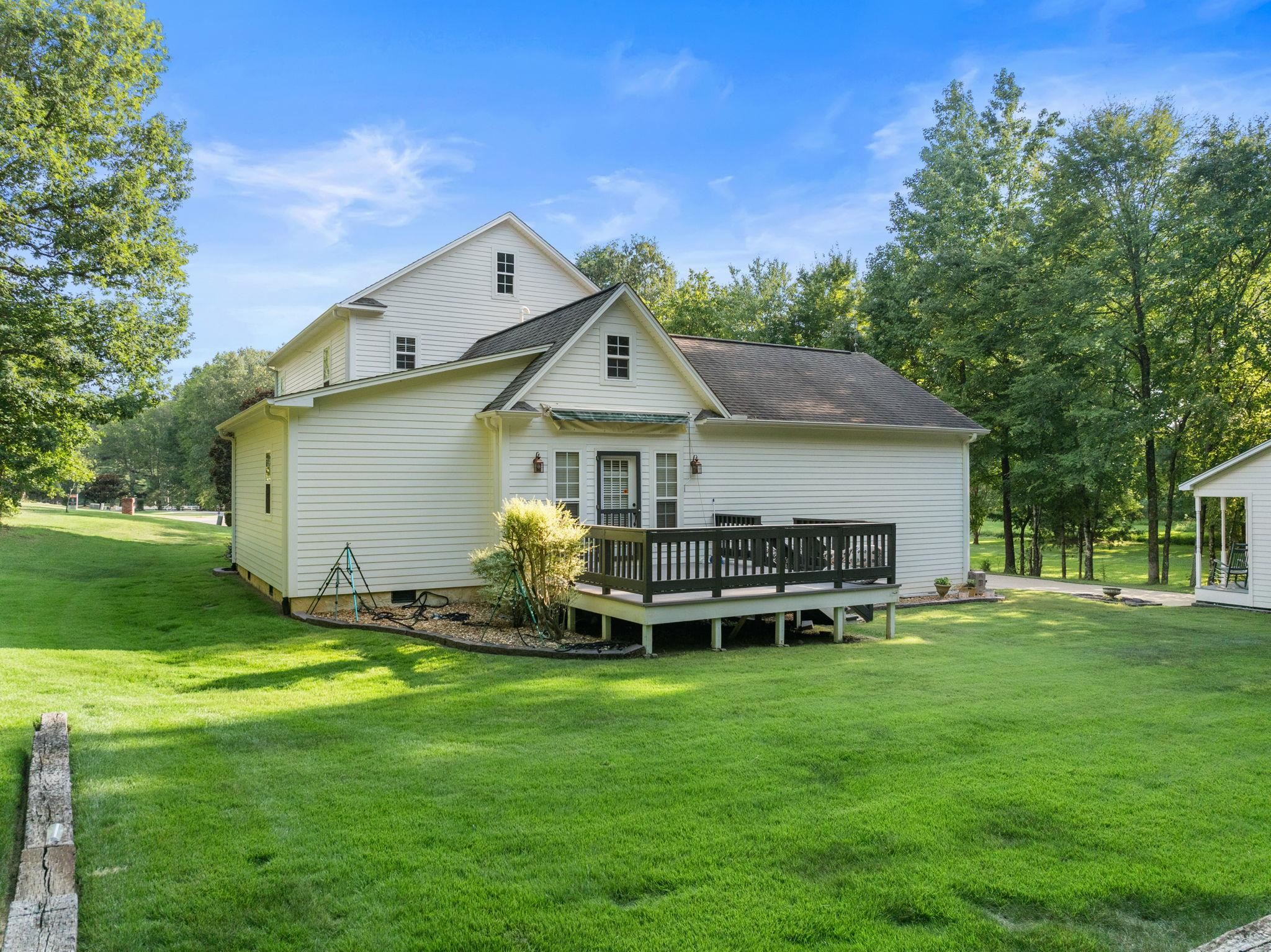 20 Tadpole Lane Corinth, MS 38834 - Photo 26 of 38 Rear view of property with a deck and a lawn