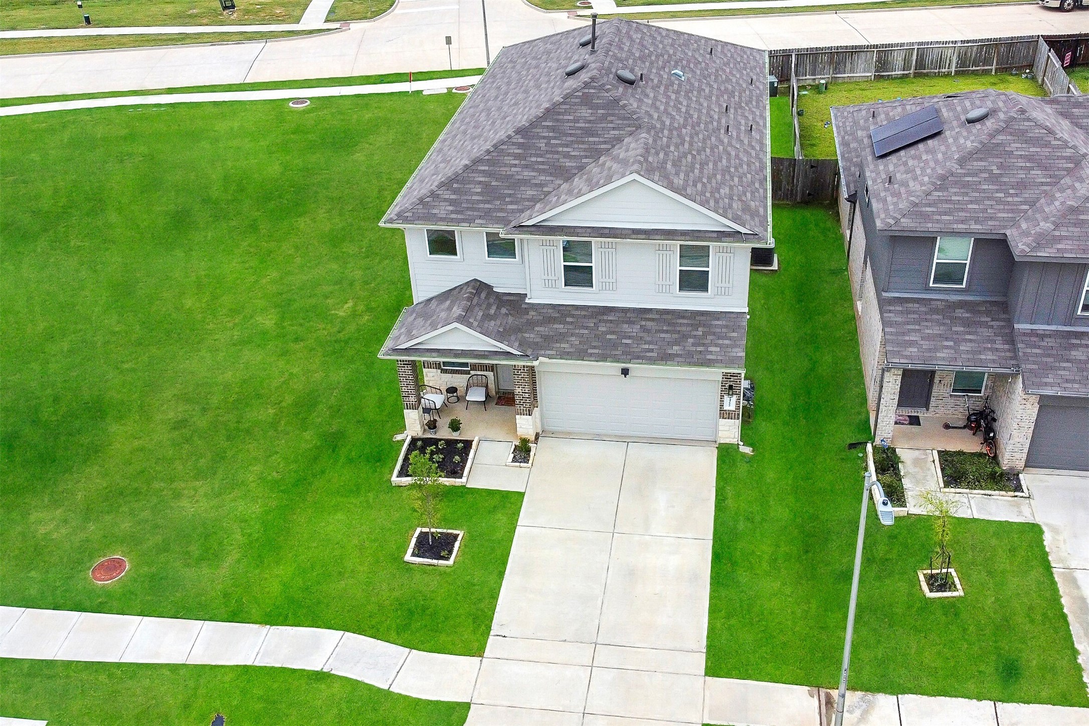 24222 Sandstone Valley Ln Spring Spring, TX 77373 - Photo 2 of 32 a aerial view of a house with a yard