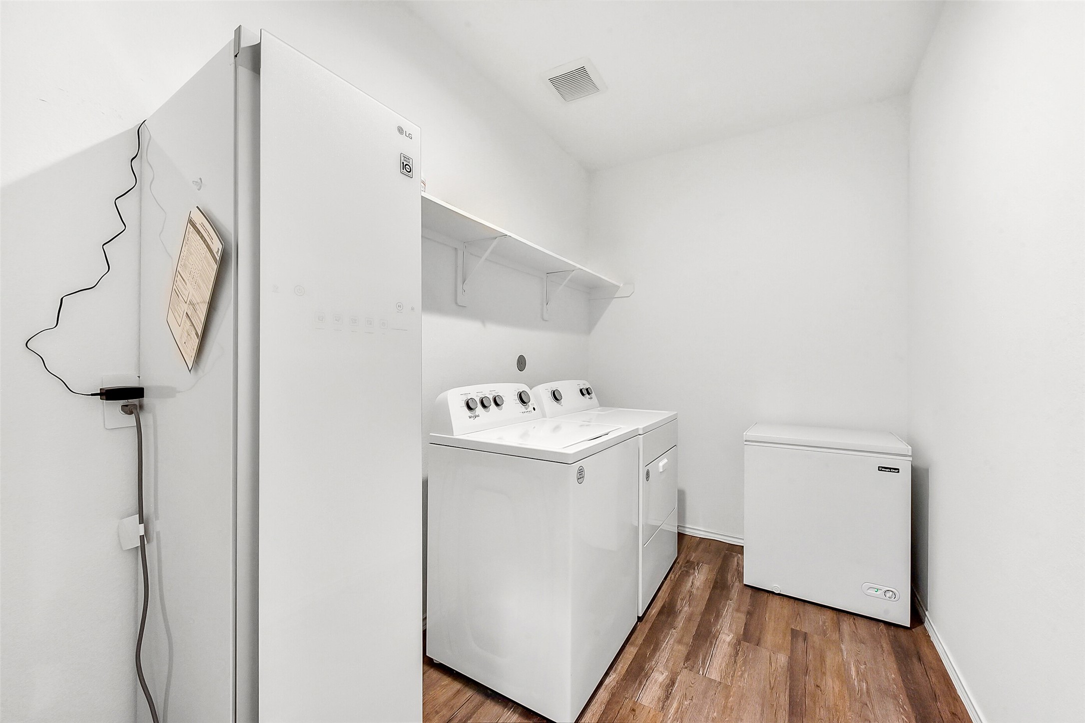 24222 Sandstone Valley Ln Spring Spring, TX 77373 - Photo 28 of 32 a utility room with dryer and washer
