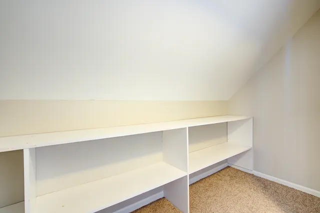 a view of an empty walk in closet