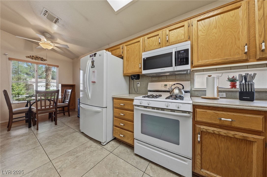 489 Dalgreen Place Henderson, NV 89012 - Photo 6 of 23 Kitchen has granite counters and Breakfast Nook.