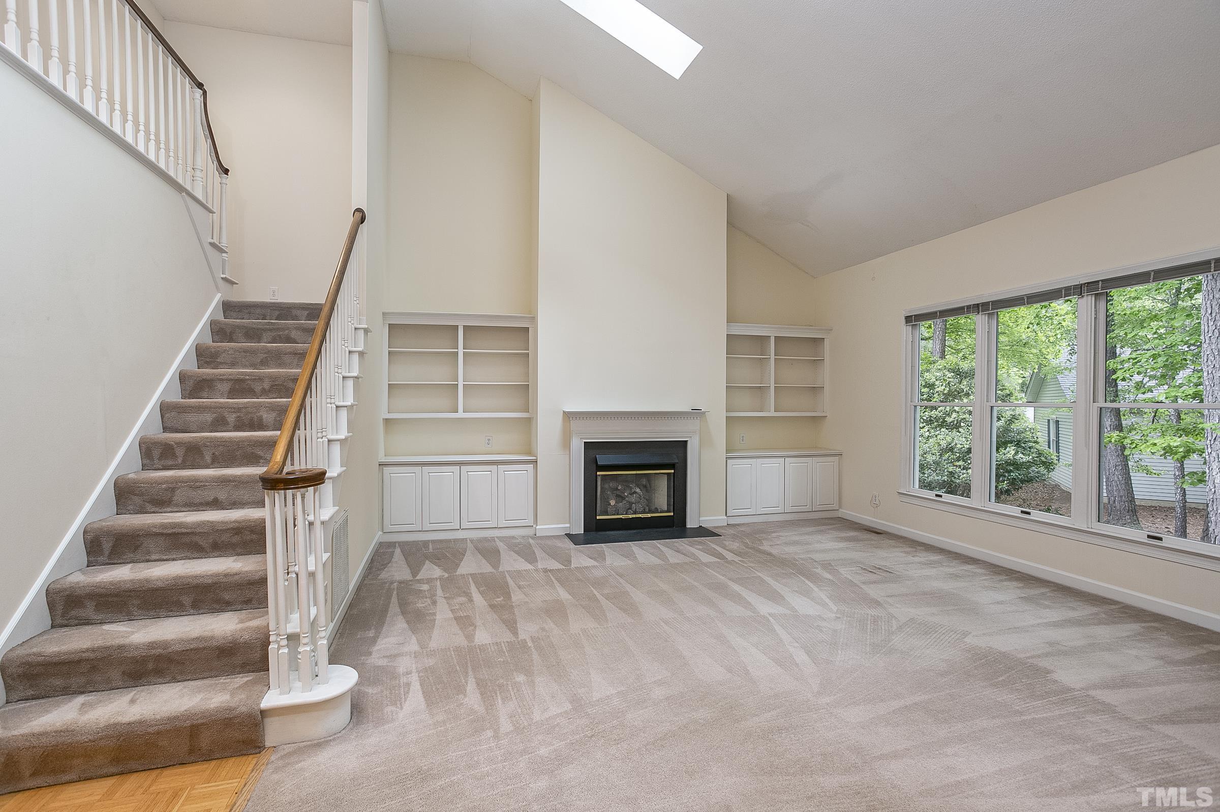 547 Weathersfield Pittsboro, NC 27312 - Photo 12 of 37 a view of empty room with fireplace and windows