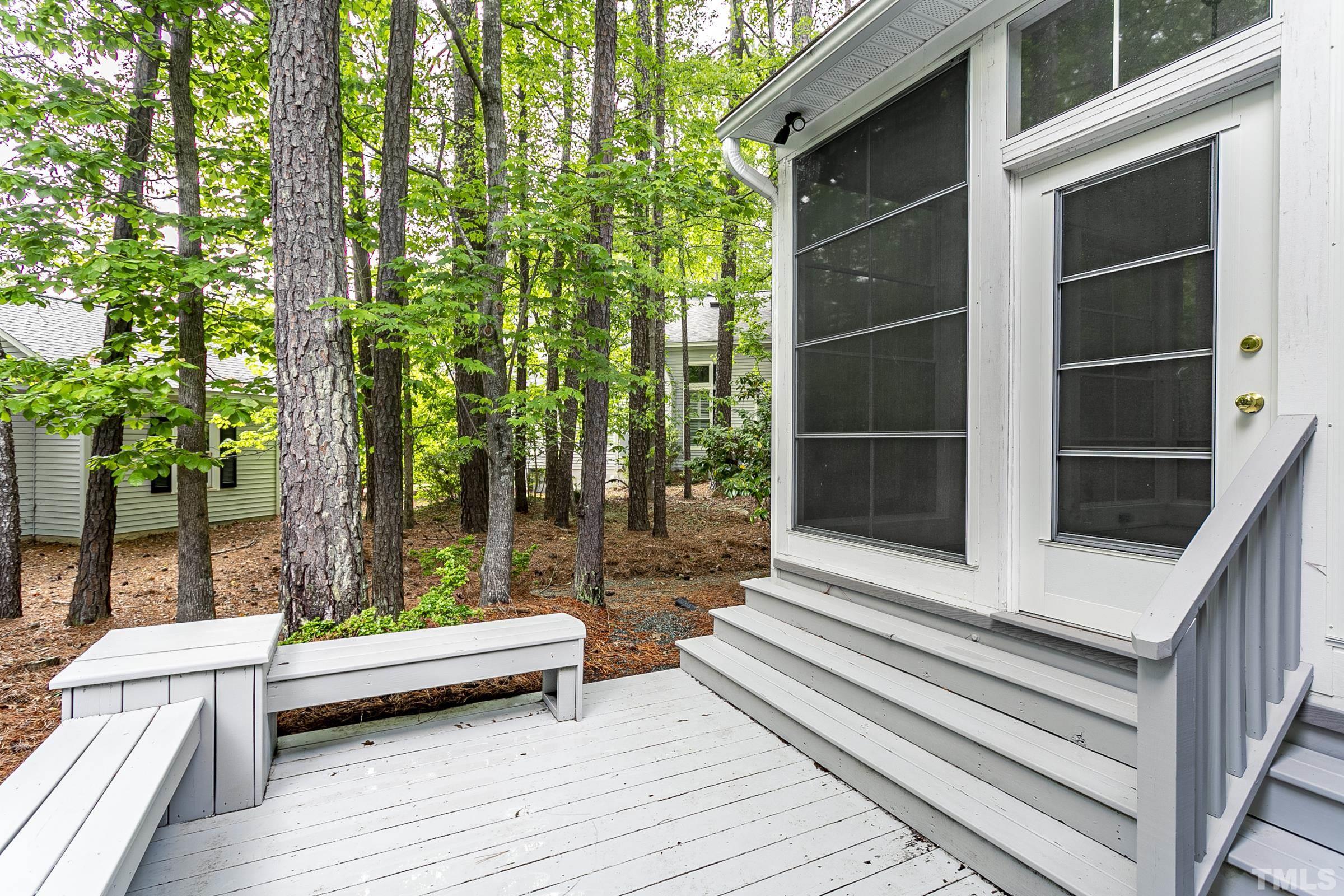 547 Weathersfield Pittsboro, NC 27312 - Photo 33 of 37 a view of balcony with wooden floor and fence next to a large window