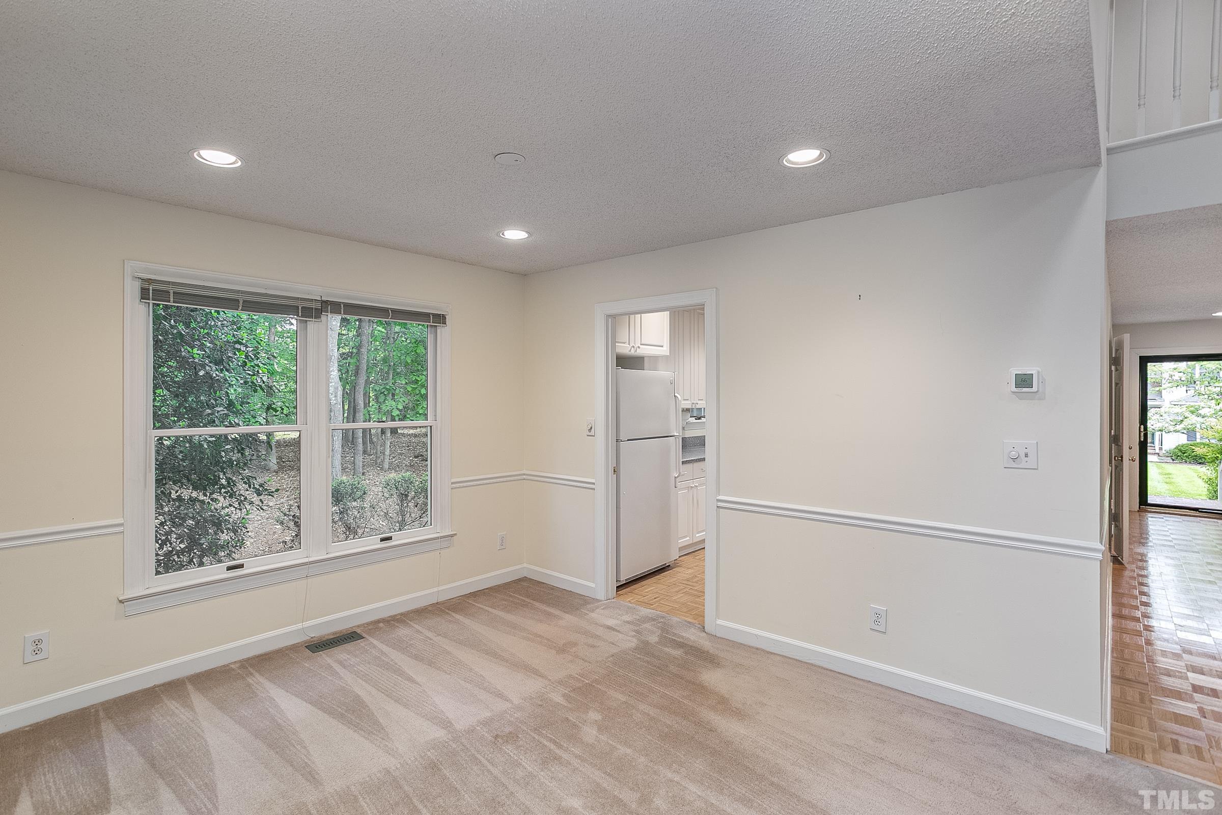 547 Weathersfield Pittsboro, NC 27312 - Photo 9 of 37 a view of empty room with wooden floor and fan