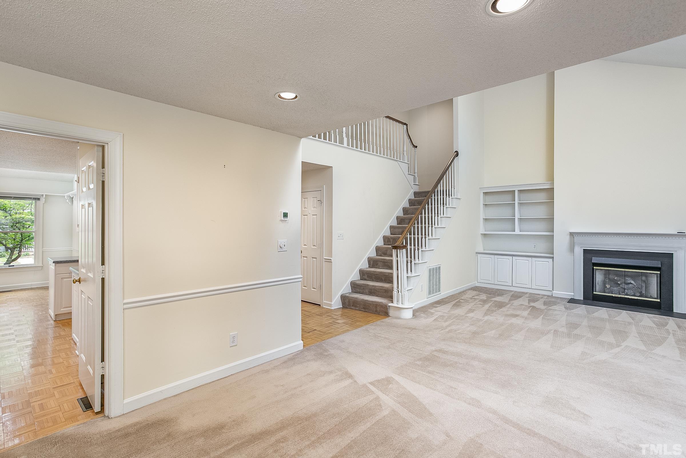 547 Weathersfield Pittsboro, NC 27312 - Photo 10 of 37 a view of a livingroom with a staircase