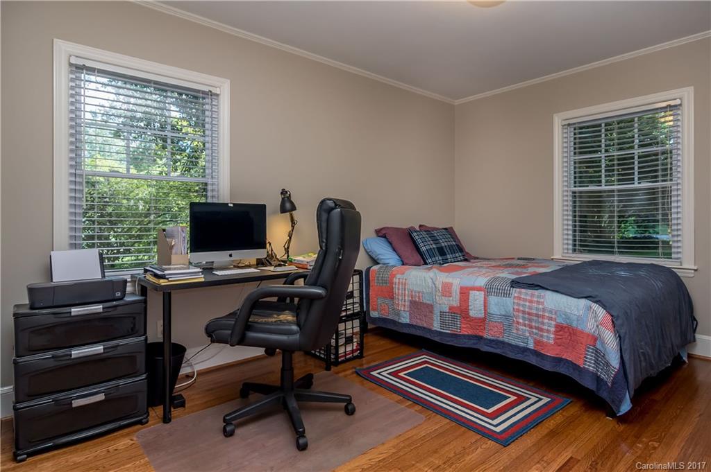 4749 Gaynor Road Charlotte, NC 28211 - Photo 18 of 24 a bedroom with a bed and a window