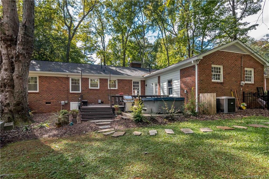4749 Gaynor Road Charlotte, NC 28211 - Photo 23 of 24 a backyard of a house with yard fire pit and outdoor seating