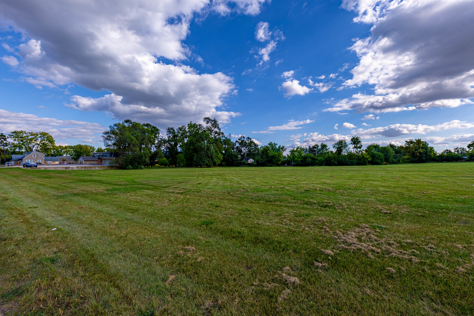 255 West Romeo Road Romeoville, IL 60446 - Photo 6 of 7 a view of a big yard with a house in the background