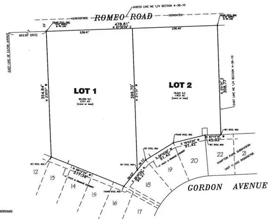 a picture of a bathroom with a shower