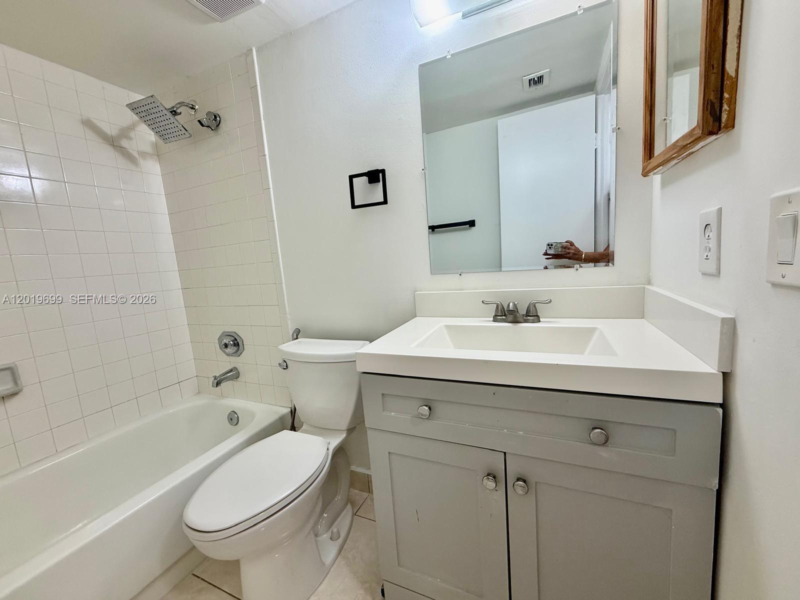 3470 Foxcroft Road, Unit 204 Miramar, FL 33025 - Photo 24 of 40 a bathroom with a sink toilet vanity and bathtub