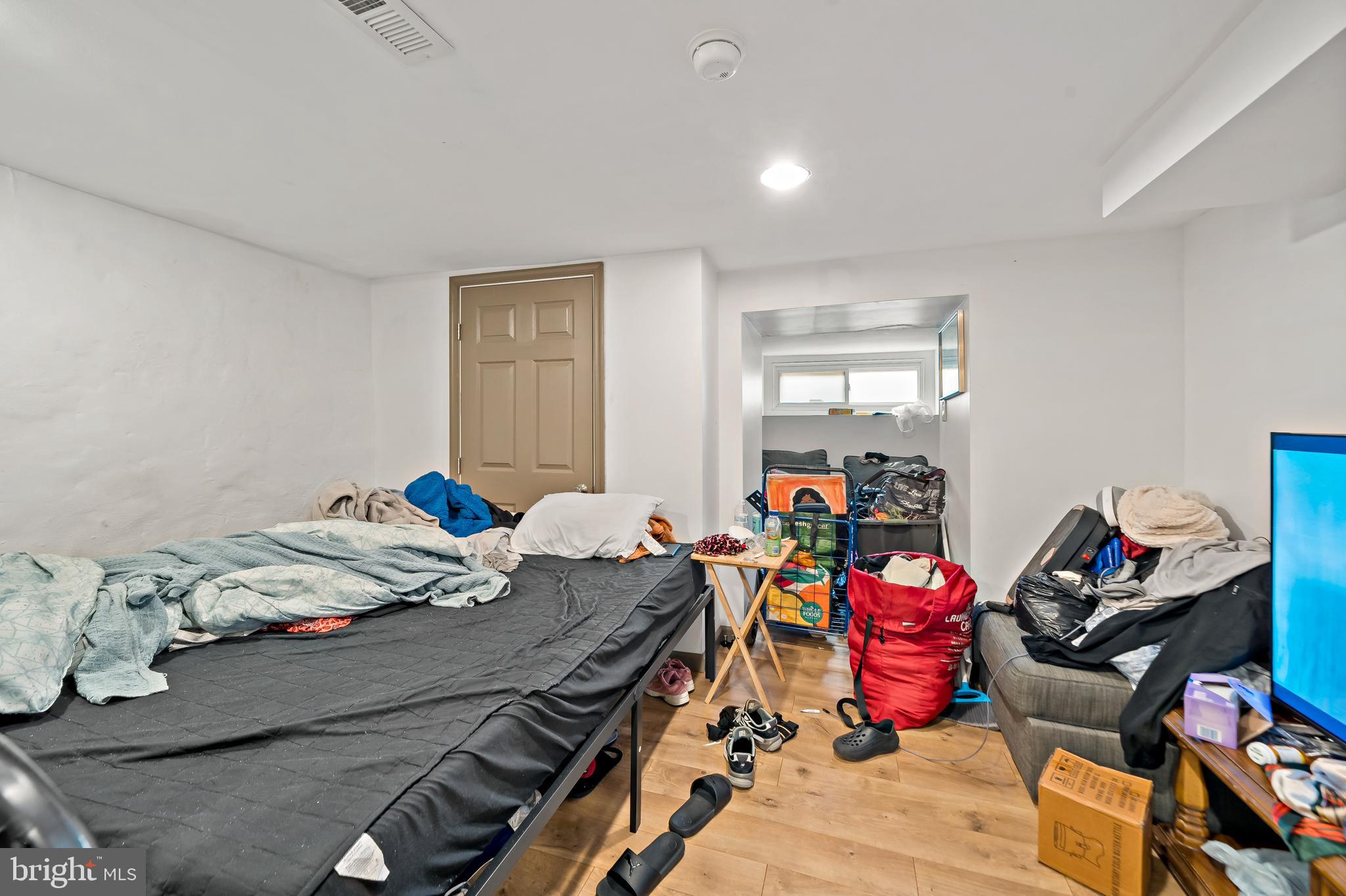 653 North 33rd Street Philadelphia, PA 19104 - Photo 15 of 28 a bed room with a bed and a chair