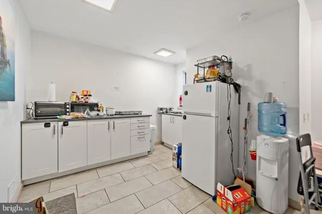 a storage room with cabinets