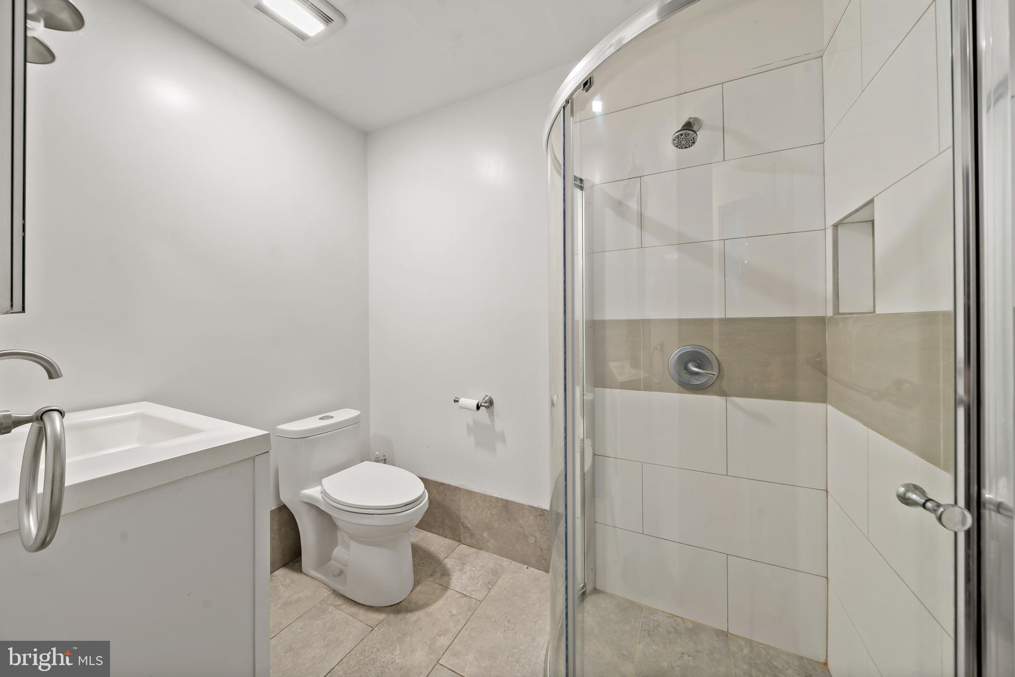 653 North 33rd Street Philadelphia, PA 19104 - Photo 8 of 28 a bathroom with a toilet and a sink