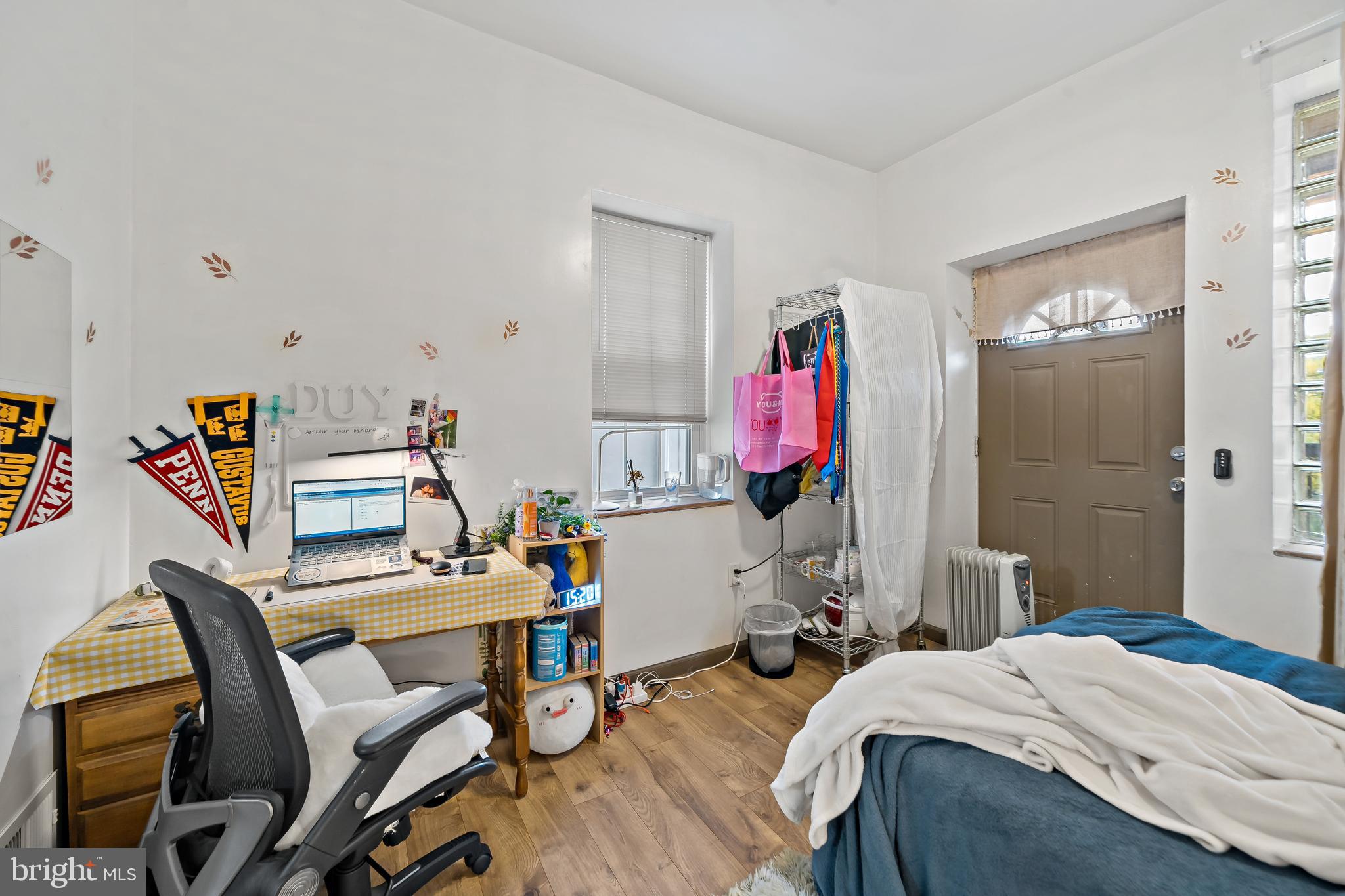 653 North 33rd Street Philadelphia, PA 19104 - Photo 10 of 28 a bed room with a bed and a desk