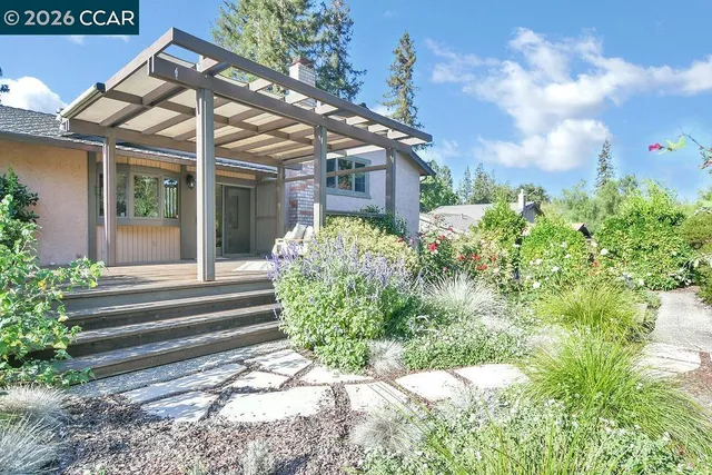 a view of house with a outdoor space