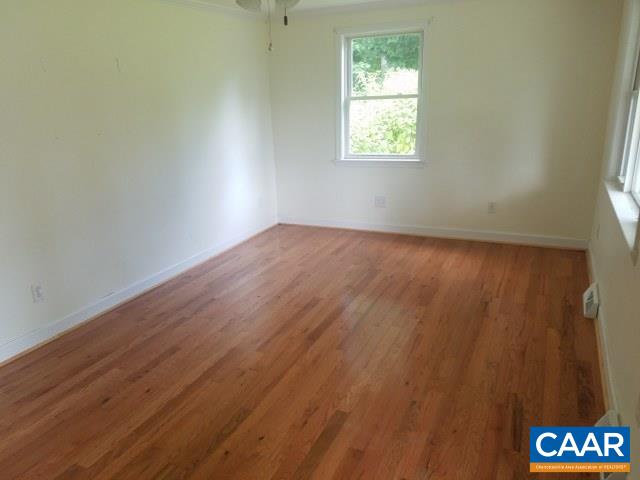620 Clarks Tract Keswick, VA 22947 - Photo 6 of 21 an empty room with a window