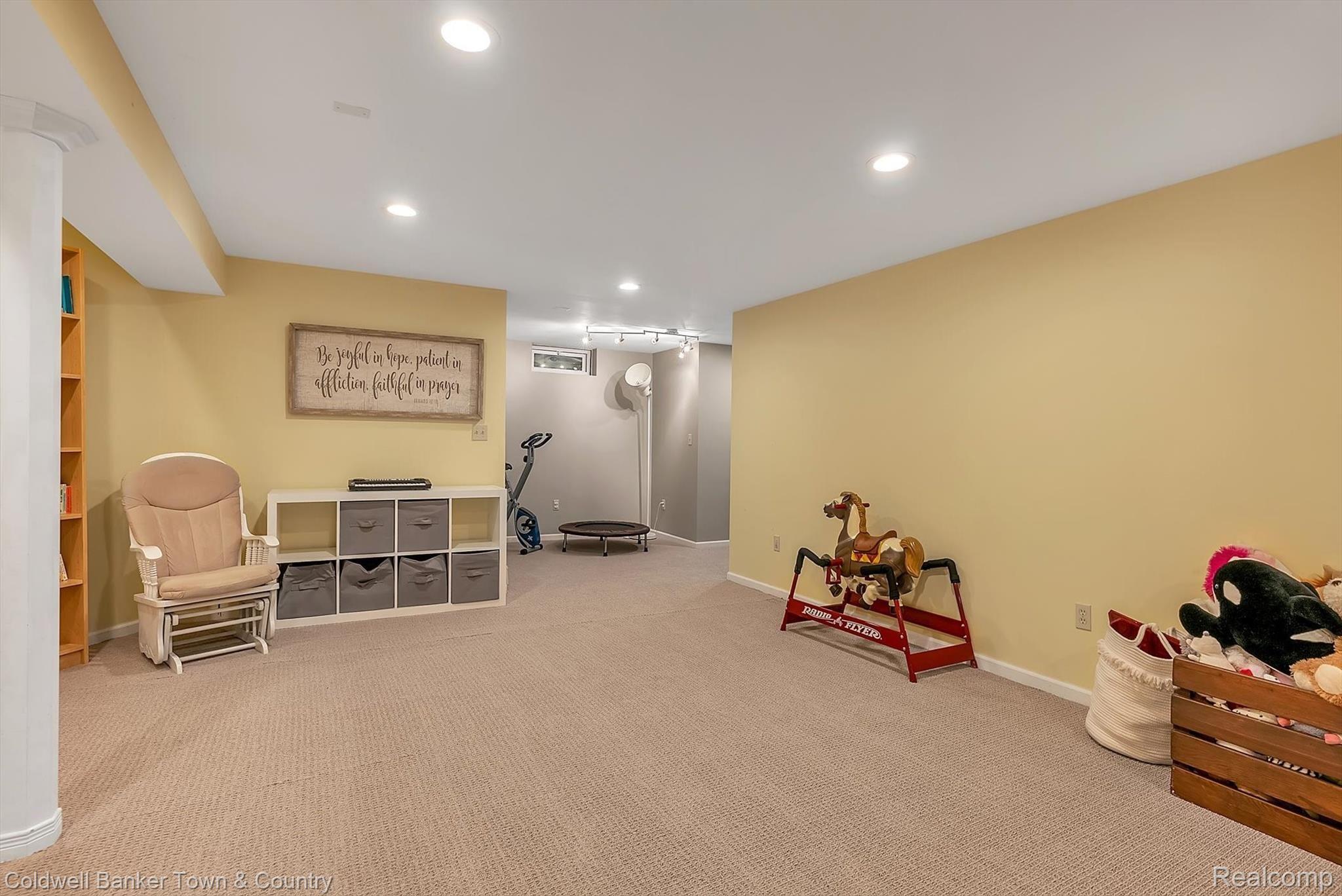 5431 Evans Road Holly, MI 48442 - Photo 42 of 81 Huge Living Area/Play Room/Home Theater with brand new carpet (2021)