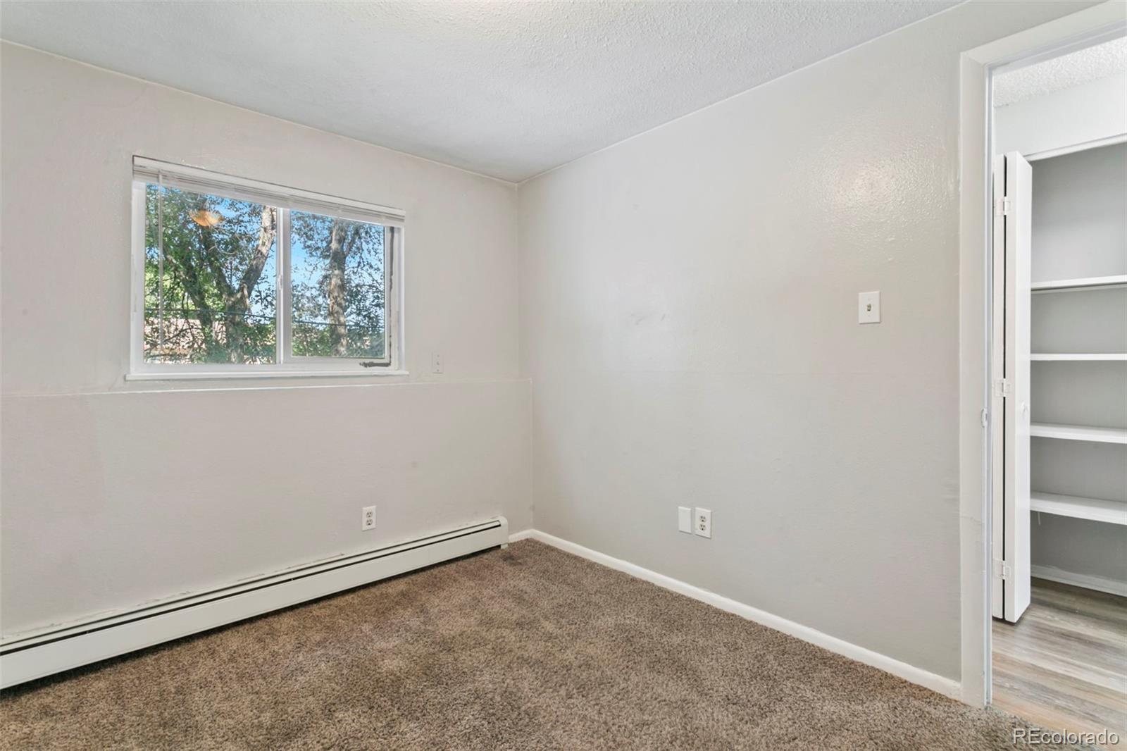 330 Vehr Drive Colorado Springs, CO 80916 - Photo 16 of 17 an empty room with a window