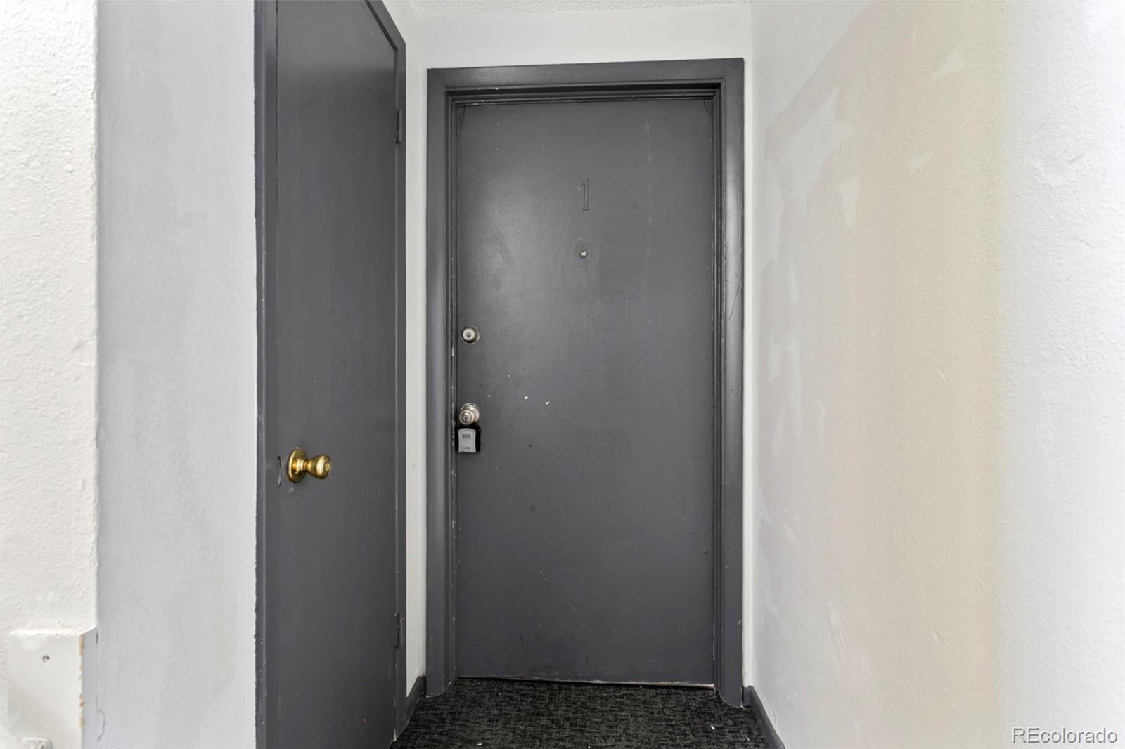 330 Vehr Drive Colorado Springs, CO 80916 - Photo 2 of 17 a view of an entryway with wooden floor