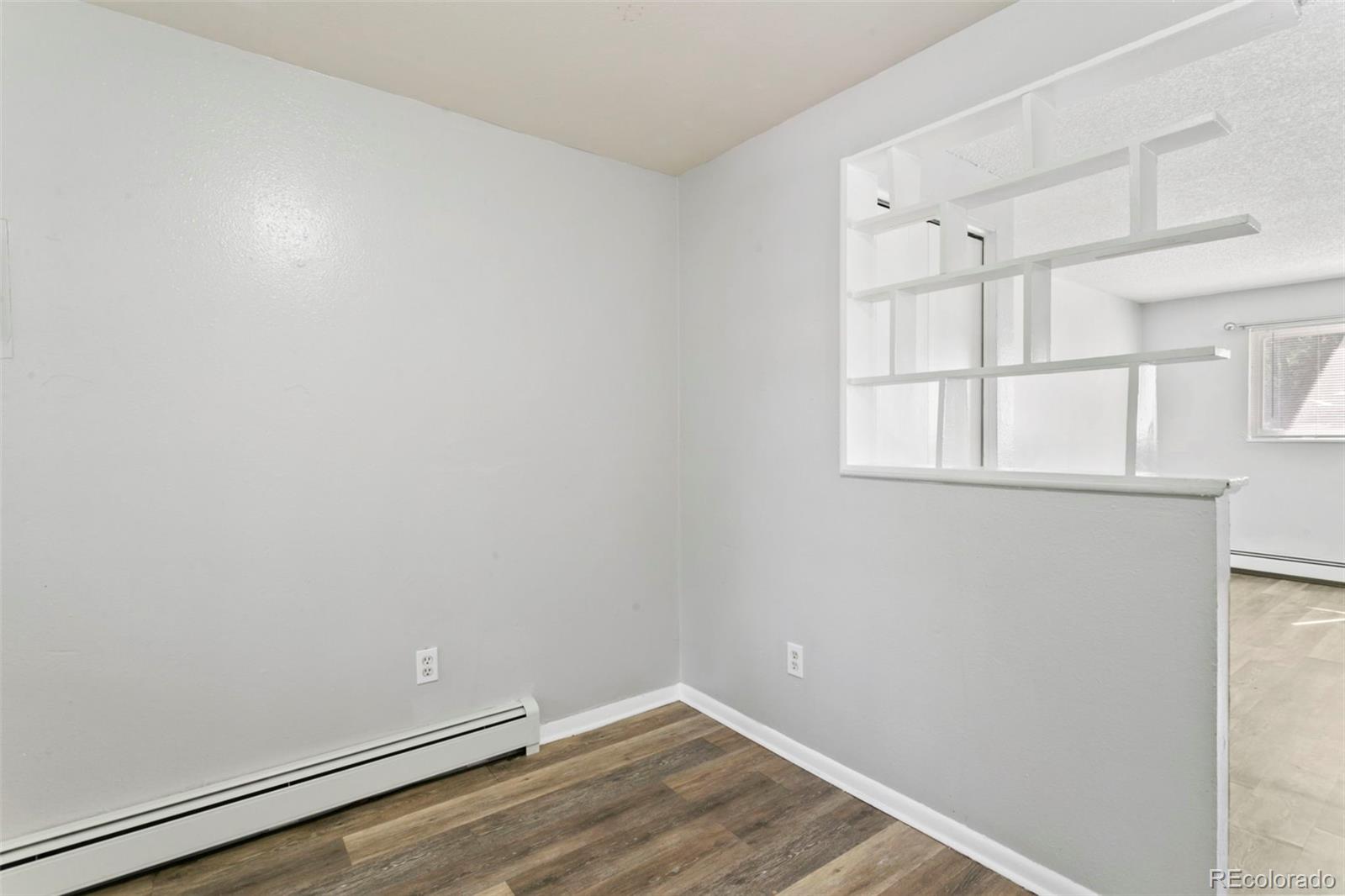 330 Vehr Drive Colorado Springs, CO 80916 - Photo 10 of 17 wooden floor in an empty room