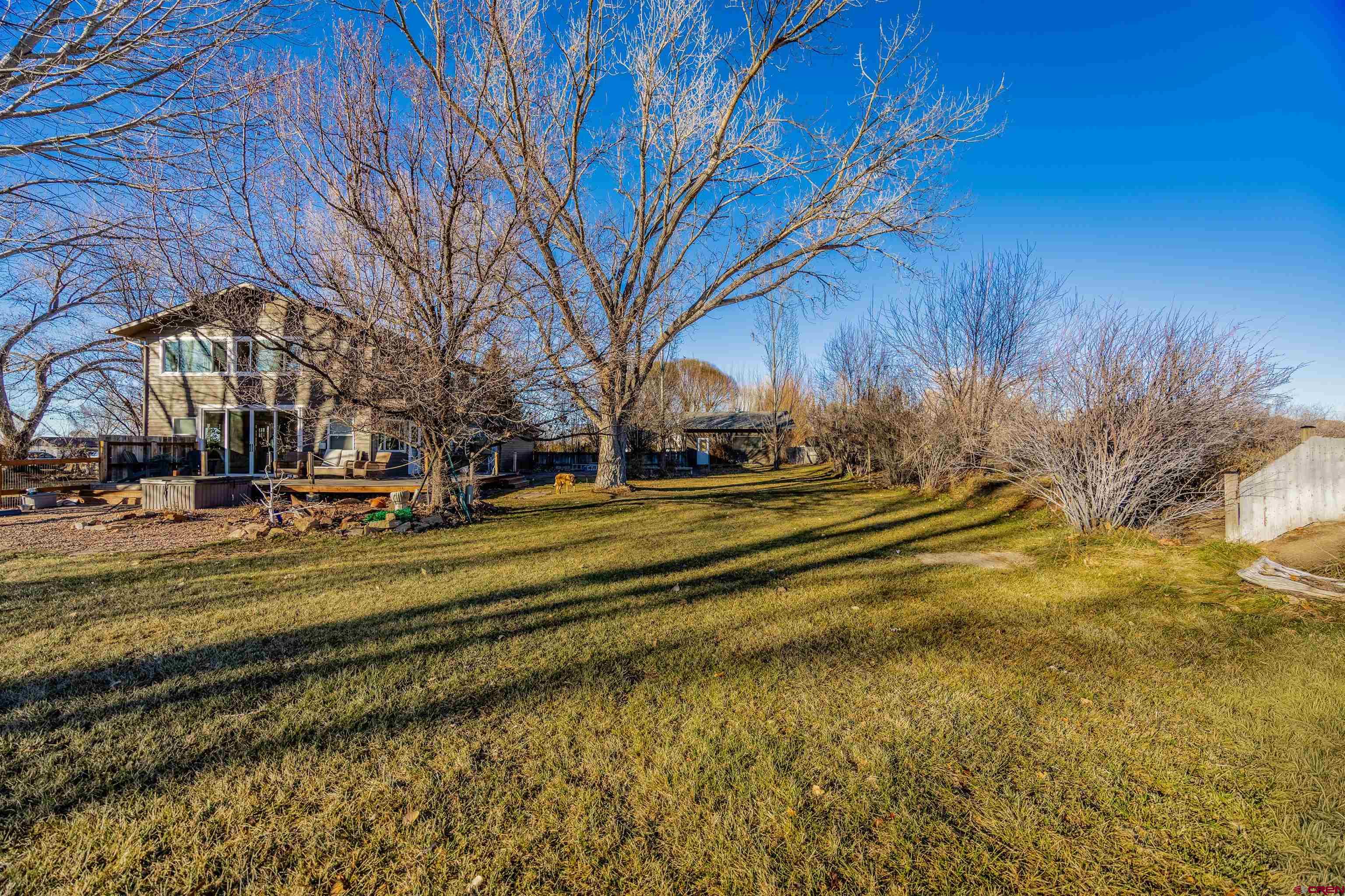 15214 6125th Road Montrose, CO 81403 - Photo 37 of 45 a view of a yard in front of a house