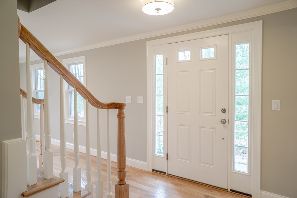 305 Old Pickard Road Concord, MA 01742 - Photo 13 of 16 a view of an entryway with wooden floor