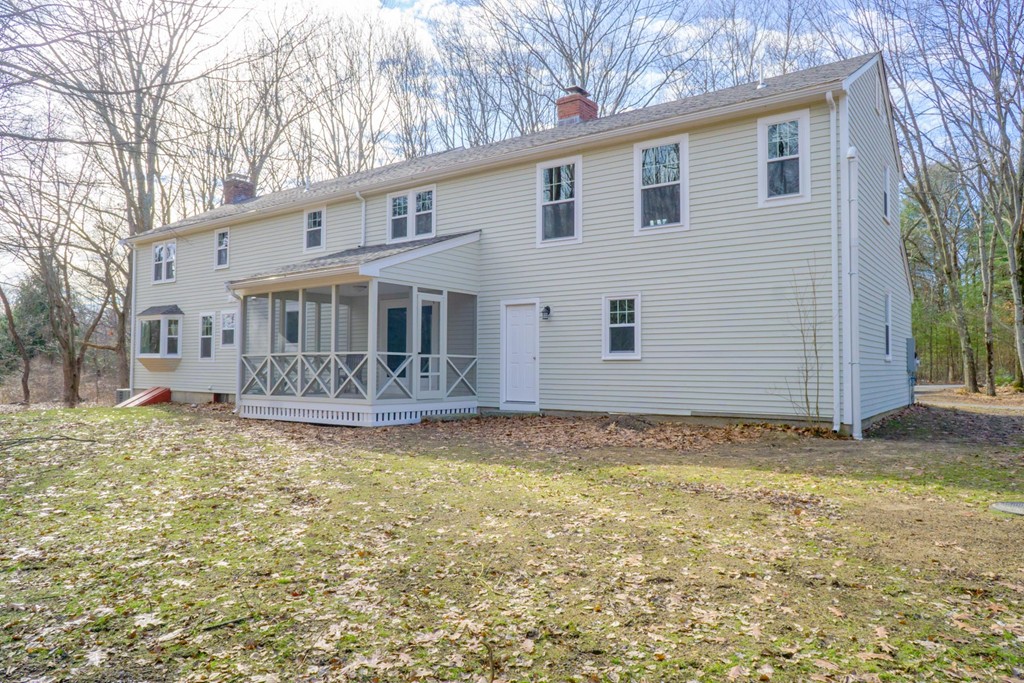 305 Old Pickard Road Concord, MA 01742 - Photo 16 of 16 a view of a house with backyard and sitting area