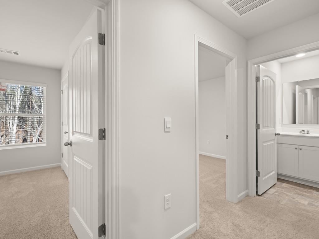 50 Rustin Ridge Dahlonega, GA 30533 - Photo 29 of 42 a bathroom with a sink and a mirror