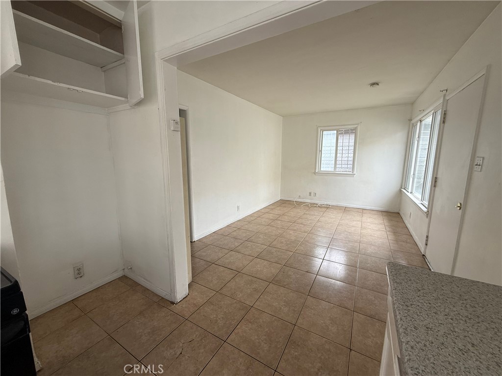 1946 Bryce Road South El Monte, CA 91733 - Photo 2 of 9 a view of a livingroom with an empty space and window