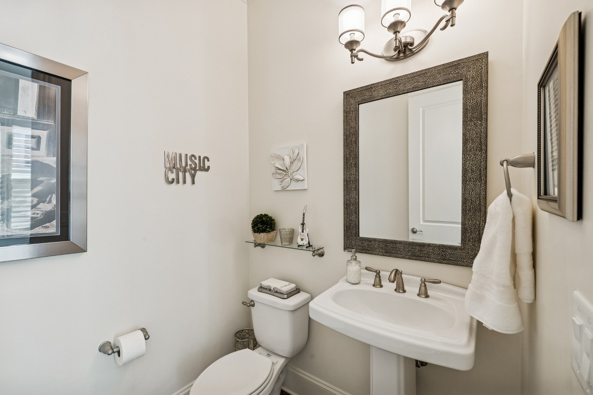 324 Fitzgerald Street Franklin, TN 37064 - Photo 20 of 28 a bathroom with a toilet sink and mirror
