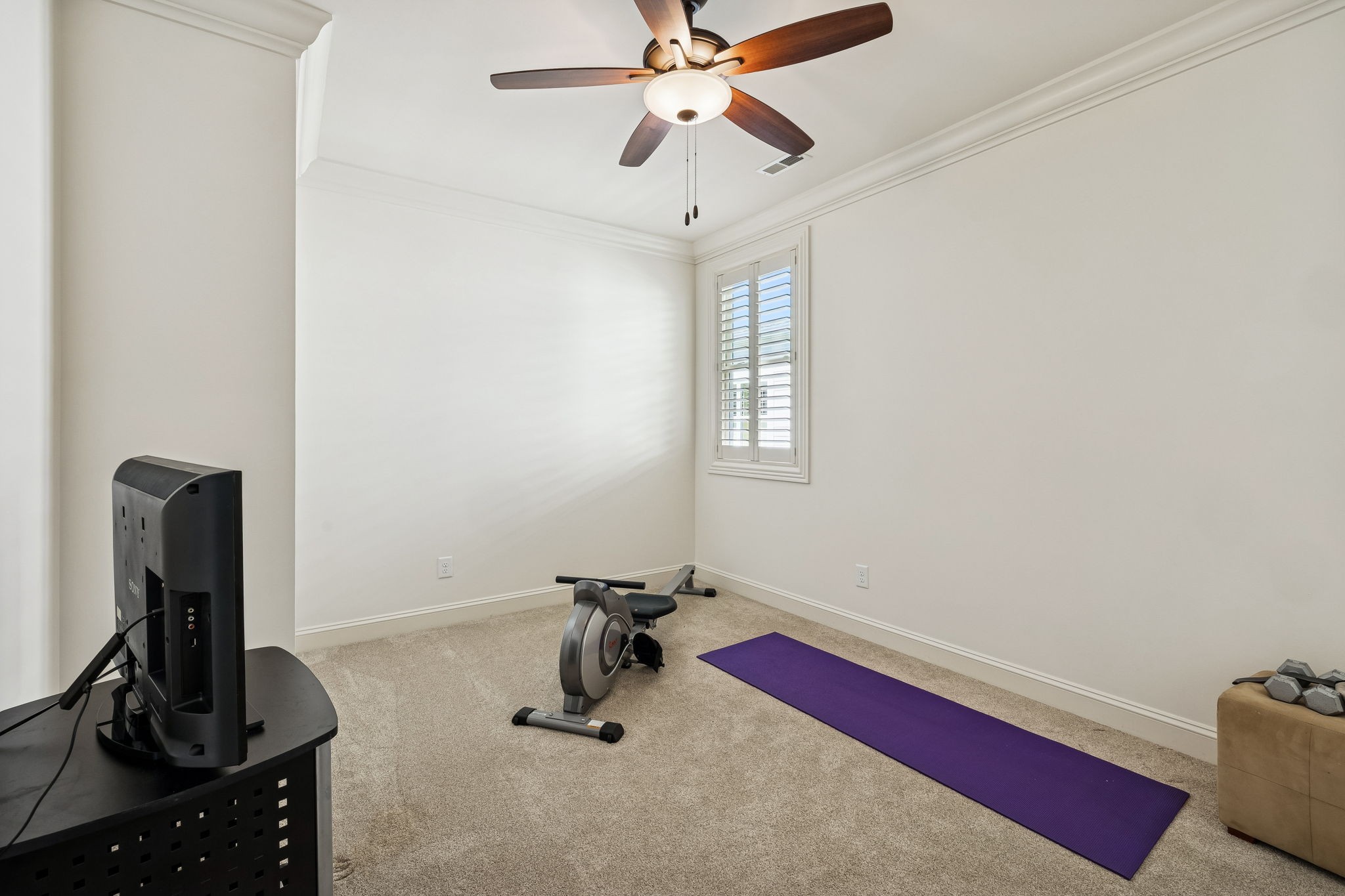 324 Fitzgerald Street Franklin, TN 37064 - Photo 21 of 28 a room with gym equipment and a window