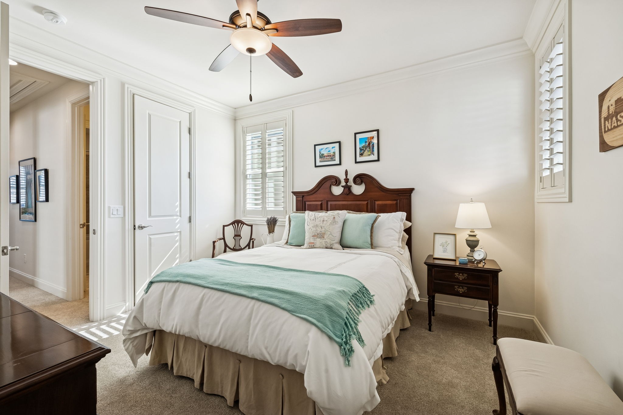 324 Fitzgerald Street Franklin, TN 37064 - Photo 23 of 28 a bedroom with a bed and a chandelier