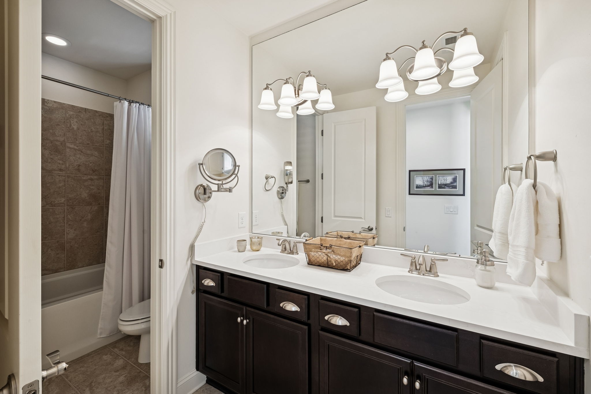 324 Fitzgerald Street Franklin, TN 37064 - Photo 24 of 28 a bathroom with a double vanity sink mirror and shower