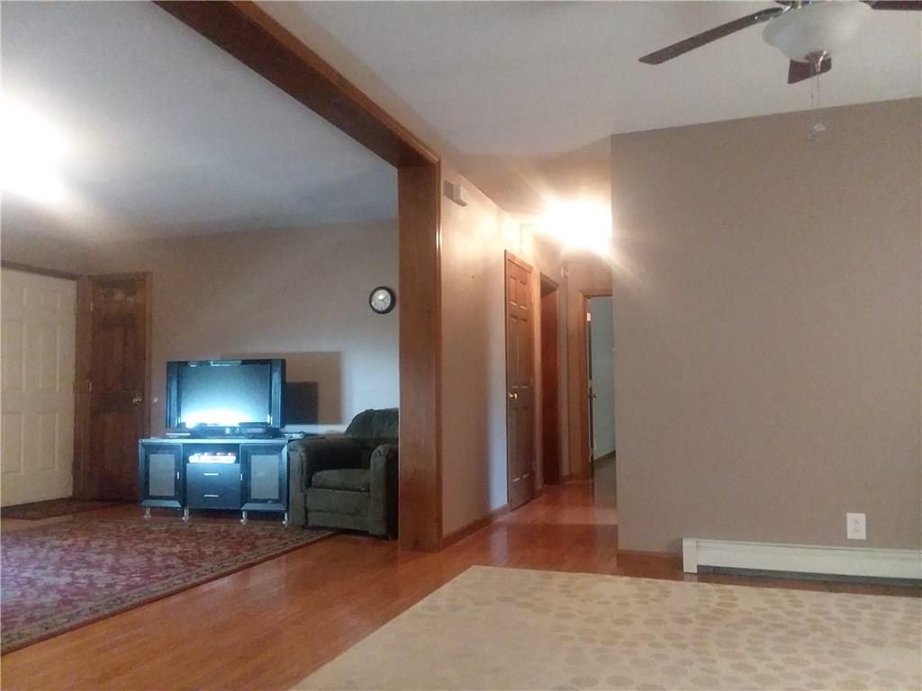 48 Bolton Hill Road Augusta, ME 04330 - Photo 2 of 31 LIVING ROOM TO DINING ROOM