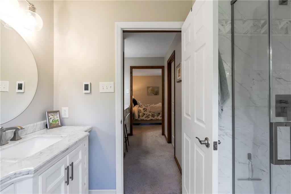 10514 Meinert Road Wexford, PA 15090 - Photo 14 of 20 Master bathroom was completely renovated with new marble vanity, open concept shower with rainfall faucet and heated marble floors. Note the touch screen on the wall to control the heated floors!