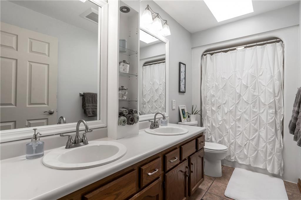 10514 Meinert Road Wexford, PA 15090 - Photo 20 of 20 Second bathroom has awesome one mold shower system that avoids any seams that usually collect dirt or mold so clean up is a breeze, ceramic flooring...there have been additional updates since this photo! Come see what they did!