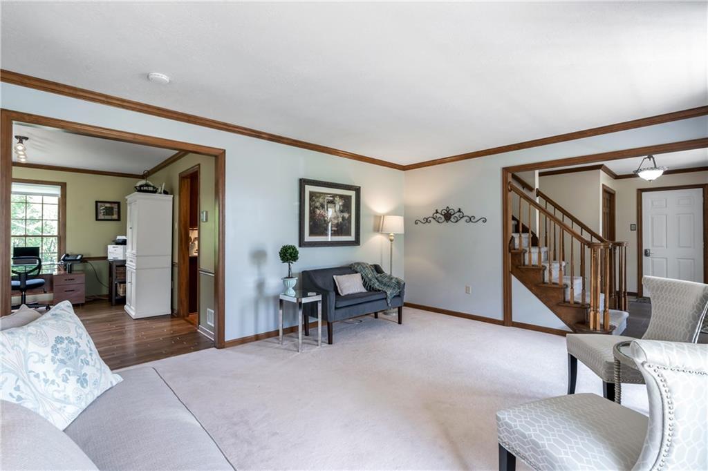 10514 Meinert Road Wexford, PA 15090 - Photo 4 of 20 Natural light abounds in the living room which boasts extra large windows and neutral paint.