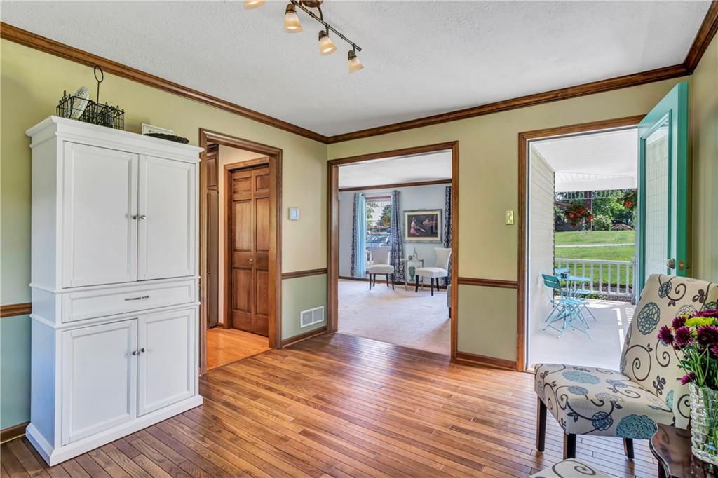10514 Meinert Road Wexford, PA 15090 - Photo 5 of 20 Generous formal dining room directly off the kitchen. Notice the door leading to the wrap around porch. Take your morning coffee and enjoy the birds.