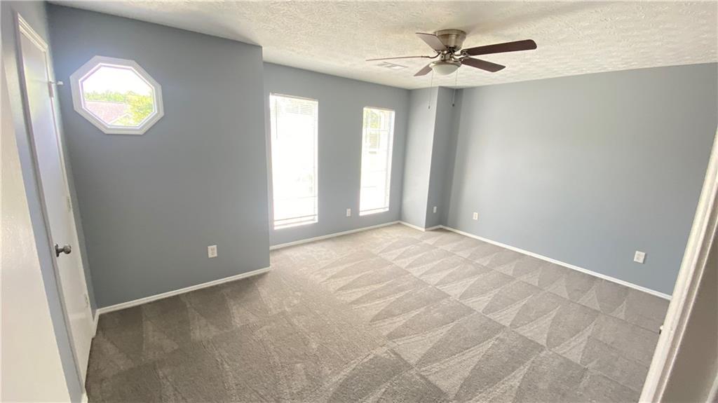 3791 Reston Lane Decatur, GA 30034 - Photo 13 of 20 an empty room with fan and windows