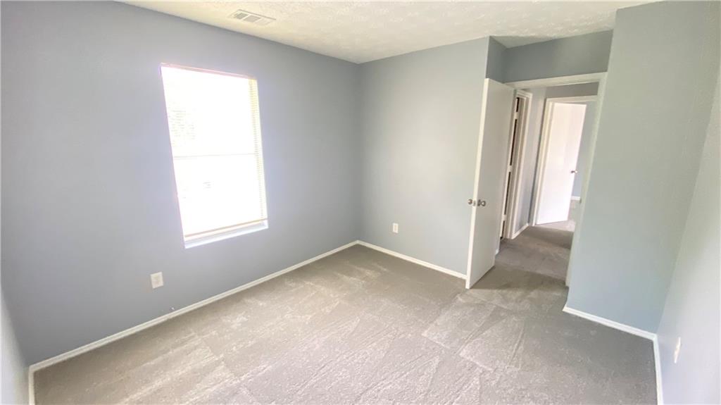 3791 Reston Lane Decatur, GA 30034 - Photo 14 of 20 an empty room with windows